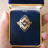 Anello vintage in oro 18K con zaffiri e diamanti
