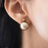 Vintage 18K gold earrings with mabe pearls and diamonds (0.20ctw approx.), 1960s