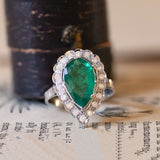 18K white gold daisy ring with emerald (2.37ct) and diamonds (0.50ct)