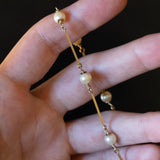 Halbstarres Vintage-Armband aus 14 Karat Gold mit Perlen, 70er Jahre