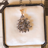 Старинный кулон из 18-каратного золота и серебра с бриллиантами огранки «розетка», начало 900-х гг.