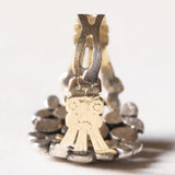 Vintage-Ring im antiken Stil aus 18 Karat Gold und Silber mit einem zentralen Diamanten im Brillantschliff (ca. 0.30 ct) und Diamanten im Rosettenschliff