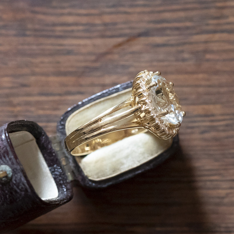 Anello a margherita vintage in oro 14K con acquamarina (6ct ca.) e diamanti (0.44ctw ca.), anni ‘60/‘70