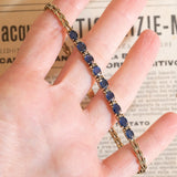 Halbstarres Vintage-Armband aus 14 Karat Gelbgold mit Saphiren (ca. 3.60 ctw) und Diamanten, 60er/70er Jahre