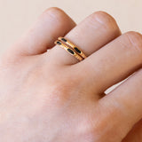 Pair of antique rings in 18K gold with black stones, early 1900s