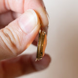 Ciondolo vintage in oro 14K con cammeo su conchiglia, anni ‘60