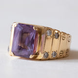 Vintage 14K gold band ring with blue-violet sapphire and white zircons, 70s