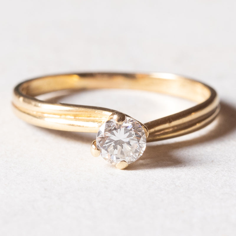 Solitario vintage in oro 18K con diamante di taglio brillante (0.22ct ca.), anni ‘60