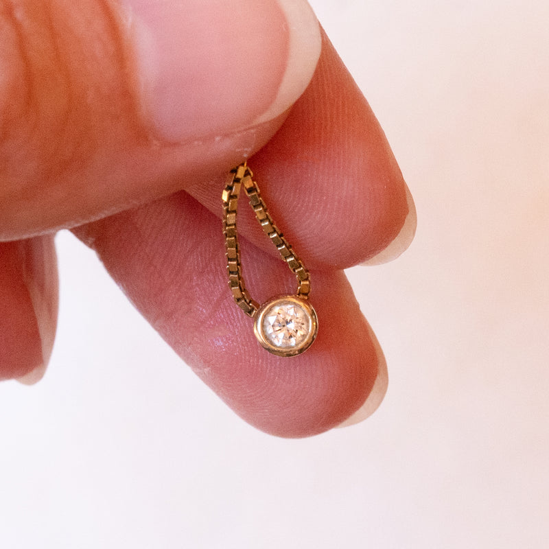 Collana vintage in oro 14K con punto luce di 0.10ct ca., anni ‘70/‘80