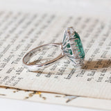18K white gold daisy ring with emerald (4.47ct) and brilliant cut diamonds (0.76ct)