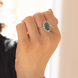18K white gold daisy ring with emerald (4.47ct) and brilliant cut diamonds (0.76ct)