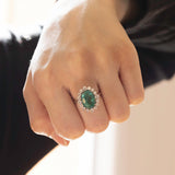 18K white gold daisy ring with emerald (4.47ct) and brilliant cut diamonds (0.76ct)