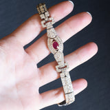 Semi-rigid vintage 18K white gold bracelet with natural ruby ​​(approx. 0.90 ct) and diamonds (approx. 6.30 ct), 60s