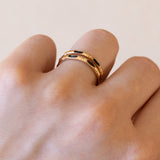 Pair of antique rings in 18K gold with black stones, early 1900s